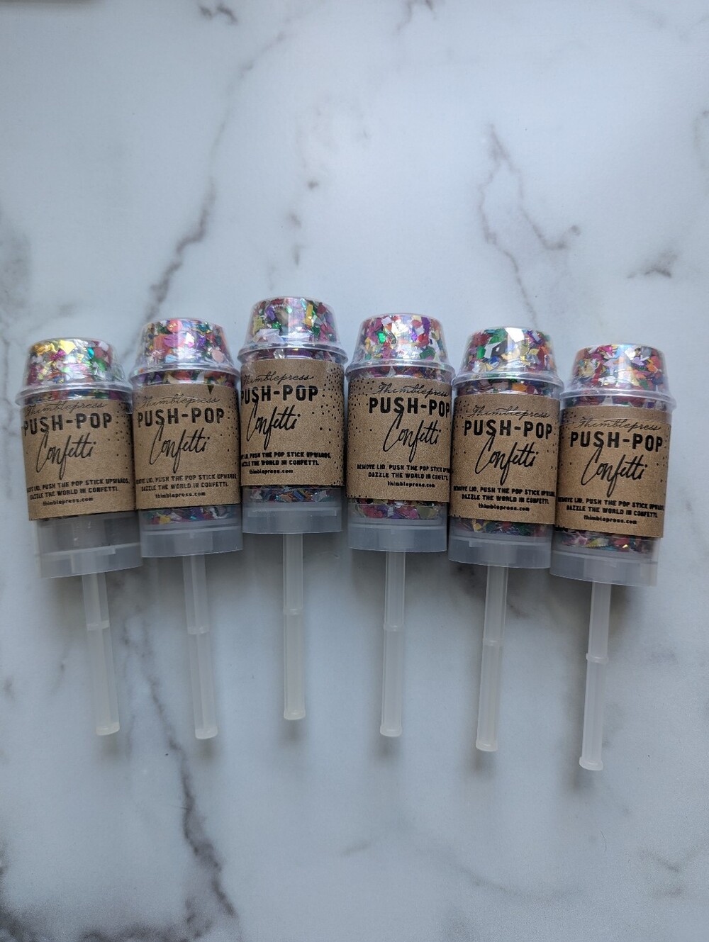 Confetti push pops from Thimblepress, party poppers